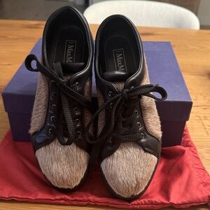 MaxMara Black Tennis shoe w/Light Brown Faux Fur accent. 37.5